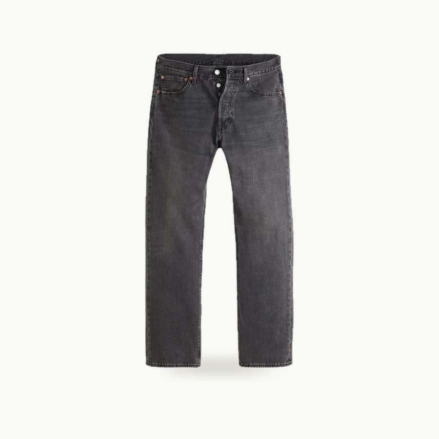 501 Original Fit Jeans: Washed black 501 Original straight-leg jeans laid flat and viewed from the front