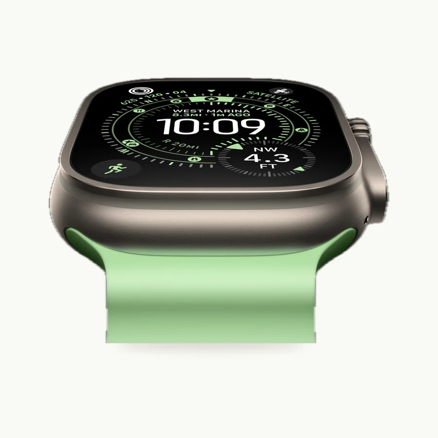 Apple Watch Ultra 3: Apple Watch Ultra 3 with a titanium case and a green band, face showing the time