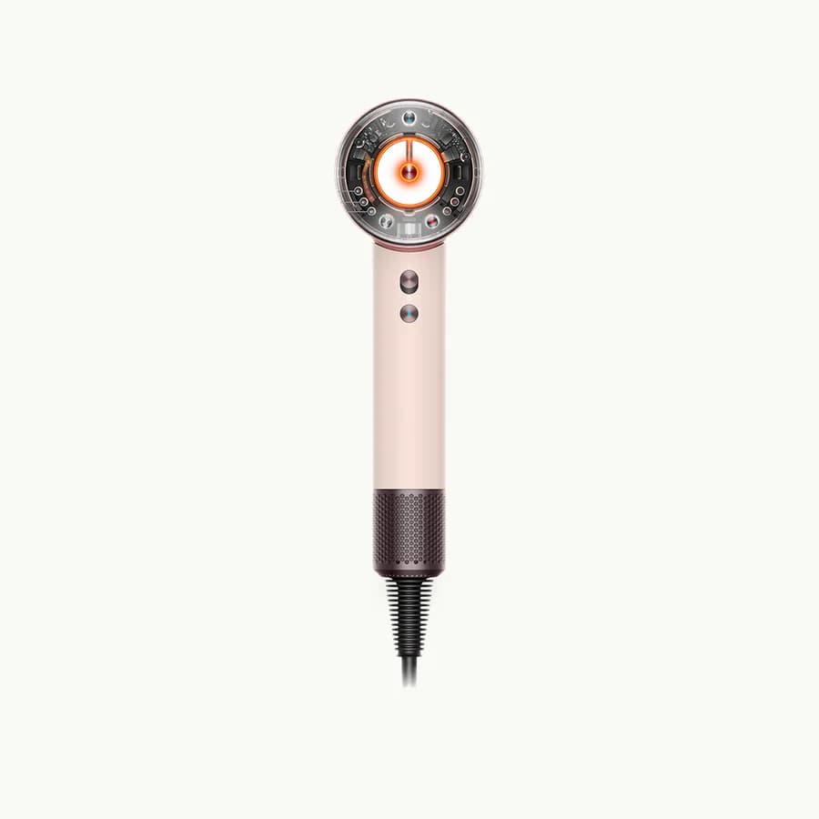 Supersonic Nural Hair Dryer: Ceramic Pink and Rose Gold Supersonic Nural hair dryer, upright, front view