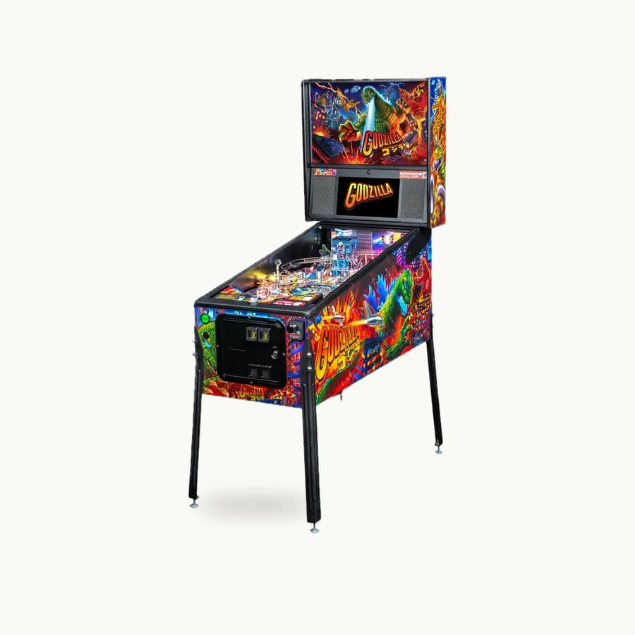 Pro Series Pinball Machine: Stern Godzilla Pro pinball machine with colorful cabinet art, three-quarter view